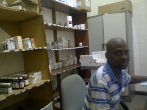 Mr. Sello Lechesa, a pharmacy technician and RxSolution user in the ART pharmacy at Maluti Adventist hospital. Photo by MSH Staff/Lesotho.