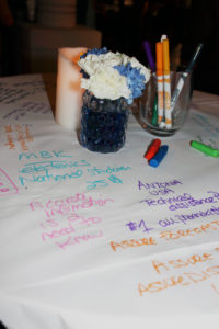 Notes and doodles of the evening’s discussions on one of the tables. | Photo Credit: Kiley Workman