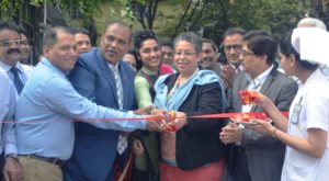 SIAPS-Bangladesh Country Project Director Zahedul Islam, Hospital Chairman Mizanur Rahman, and OPHNE Director Melissa Jones cut the ribbon at the inauguration ceremony. 