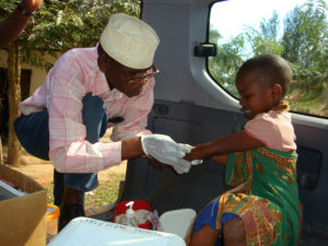 A clinical officer performs a Tuberculin skin test on a young girl in Muheza district in Tanga, Tanzania. Photo Credit: Moses Ringo/Photoshare